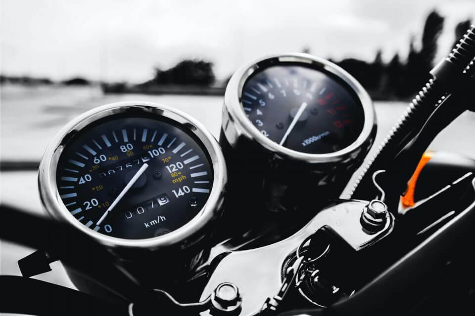motorbike dashboard showing speed and fuel