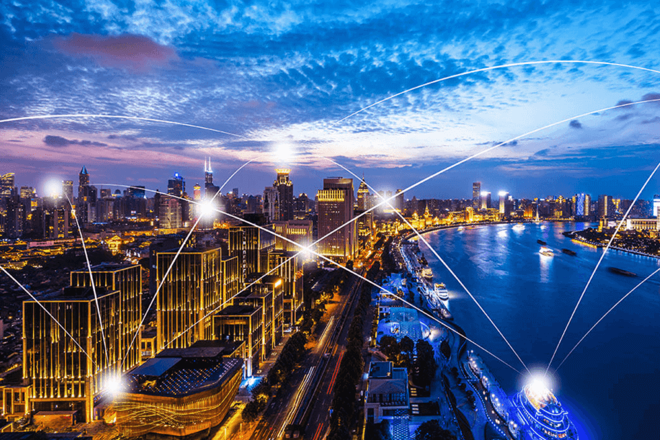 city at night with lights connecting different homes