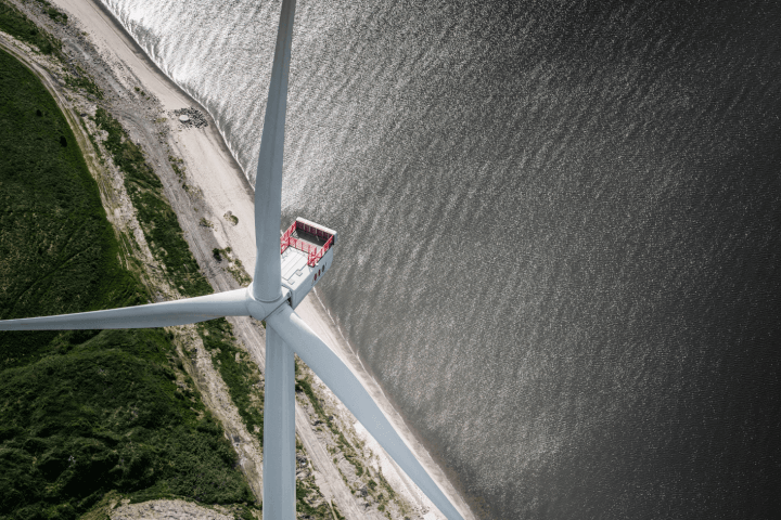 aerial view of a wind turbine on the coast