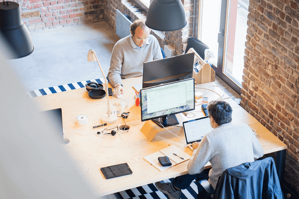 Employees in office working